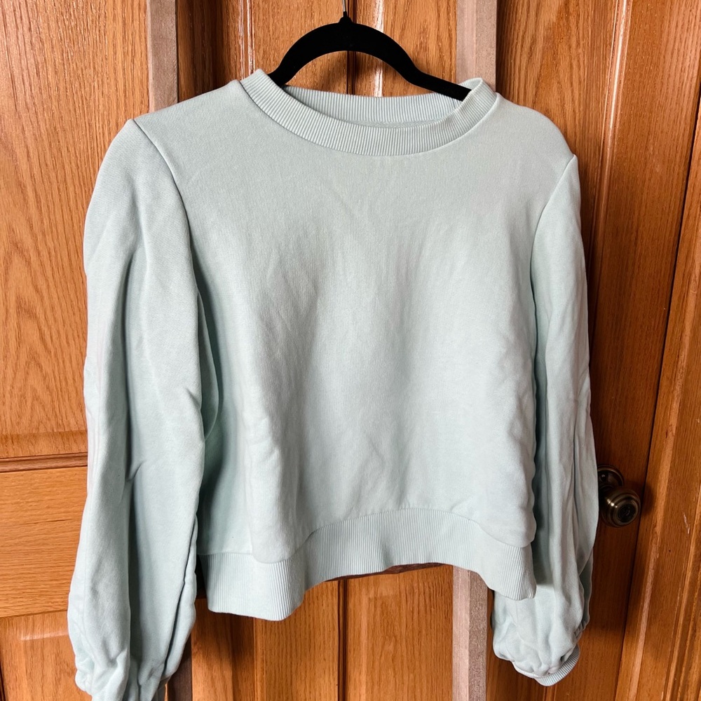 Light blue cropped sweater. Brand (a new day).  X small. Puffy sleeves.